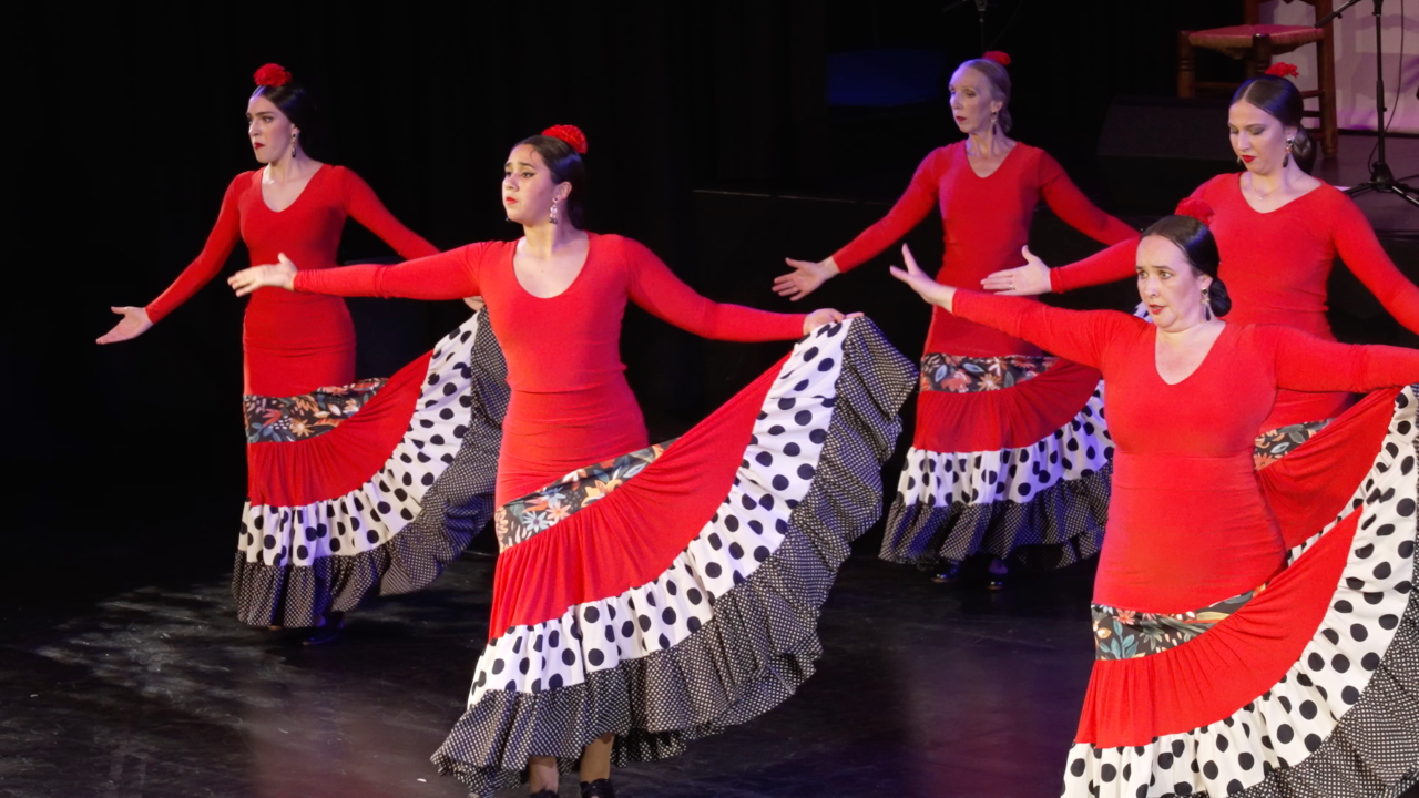 Dancers in red flamenco dresses